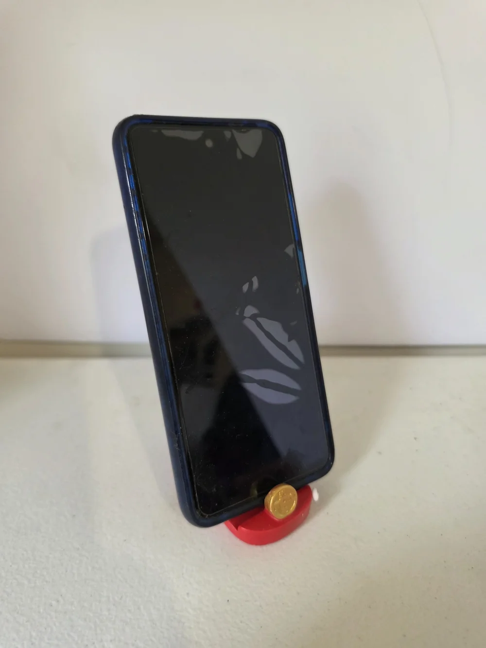 Brown Cardboard Phone Holster Packaging with Pink Label